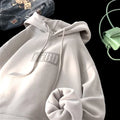 Sudadera con capucha y bolsillo delantero, corte holgado, talla 8XL, estampado de letras caladas; moda para hombres y para parejas.